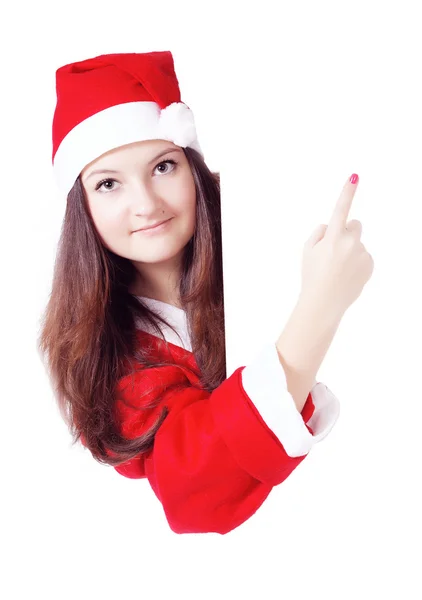 Hübsche Teenie-Mädchen als Weihnachtsmann mit einem Schild gekleidet — Stockfoto