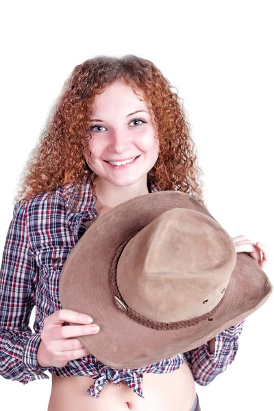 Cowboy hübsch lockiges Mädchen posiert lächelnd — Stockfoto