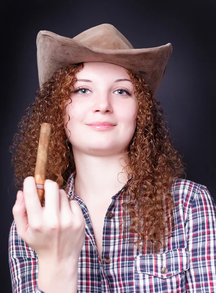Portrait of a curly girl with a cigar — Stock Photo, Image