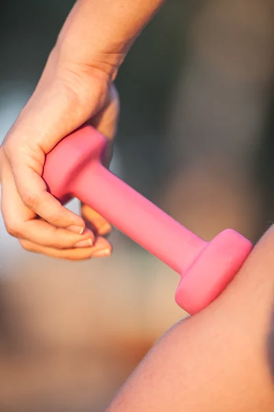 Dumbbell in your hands — Stock Photo, Image