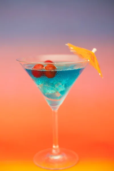 Blue cold cocktail with berries — Stock Photo, Image