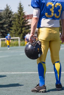 oyun dışında Amerikan futbolu oyuncusu