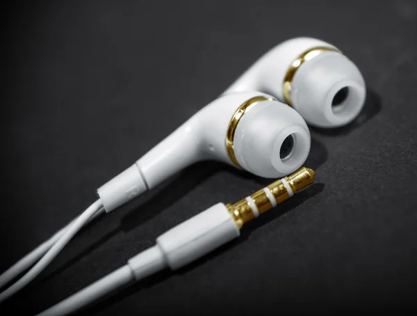 Auriculares blancos de cerca —  Fotos de Stock