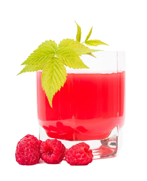 A glass of juice and raspberry green sprig — Stock Photo, Image