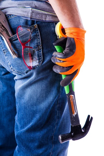 Man's back with tools in hand hammer — Stock Photo, Image