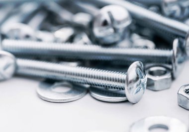 Yeni cıvata ve fındıkların arkaplanı