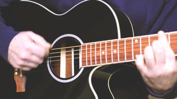 Man Playing Guitar Hands Strings Close — Stockvideo