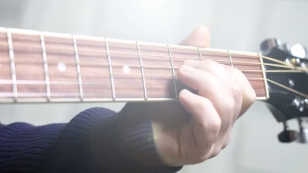 Man Playing Guitar Hands Strings Close — Stockvideo