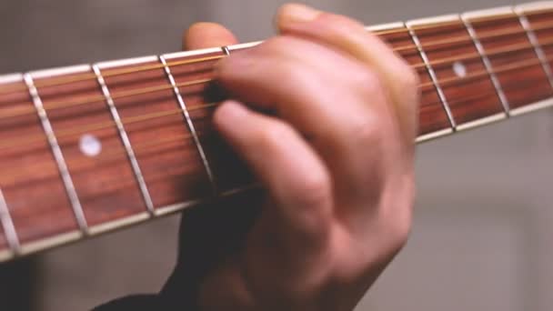 Man Playing Guitar Hands Strings Close — Stockvideo