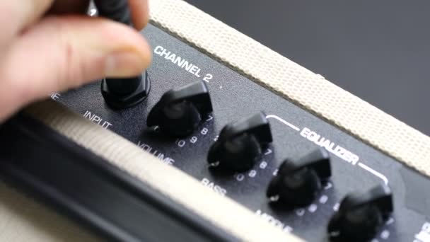 Connecting Guitar Amplifier Hands Close — стоковое видео