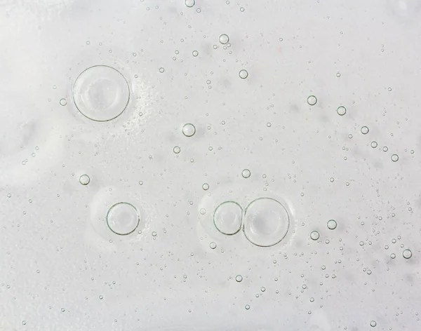 Shampoo bubble texture background. White clean soap, cosmetics backdrop