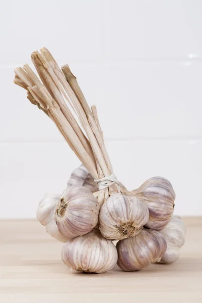 Buch of Garlic in on Kitchen Surface. — Stock Photo, Image