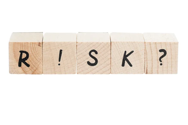 Palabra de riesgo escrita con bloques de madera . — Foto de Stock