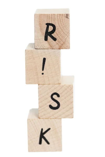 Risk Tower Spelt With Wooden Blocks. — Stock Photo, Image