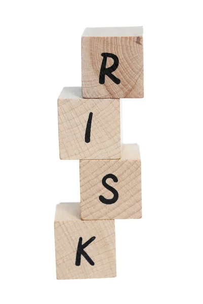 Risk Tower Spelt With Wooden Blocks. — Stock Photo, Image