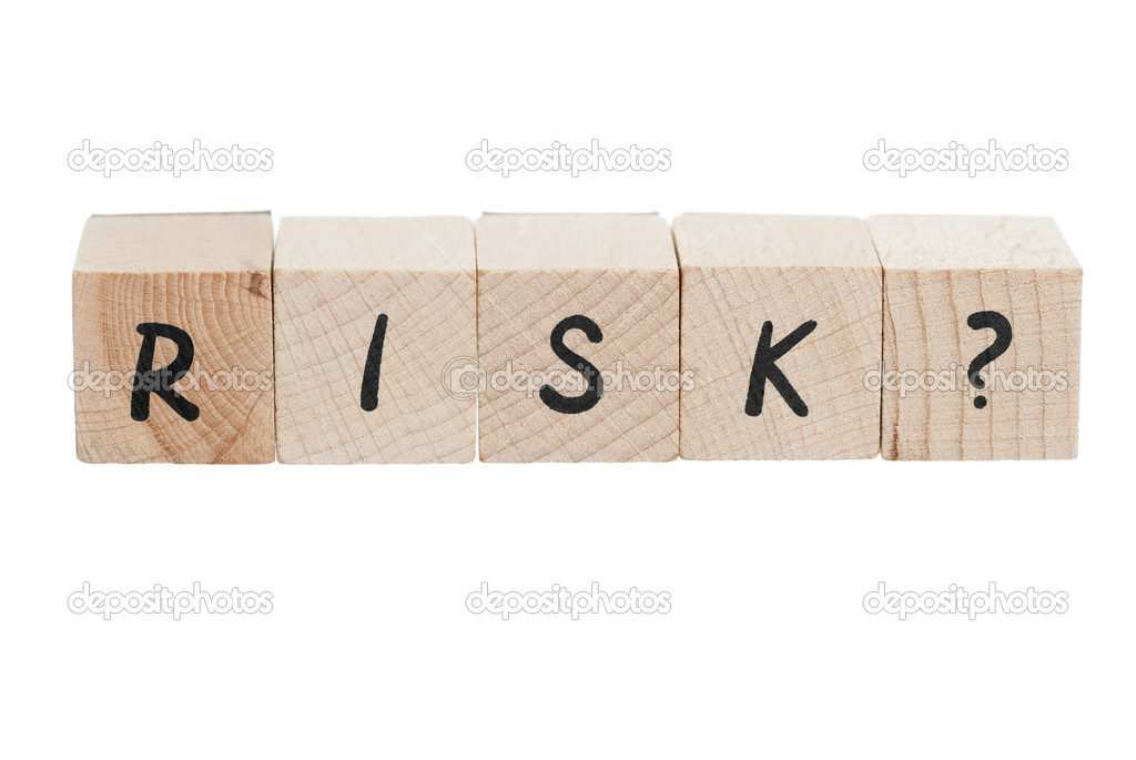 Word Risk Written With Wooden Blocks.