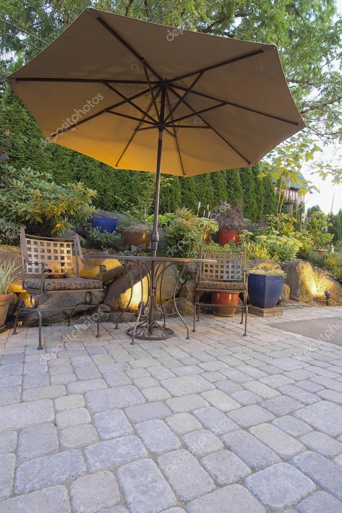 Garden Patio Table and Chairs with Umbrella Stock Photo by ©jpldesigns