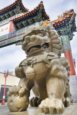 Chinese Mmale Foo Dog Guardian at Chinatown Gate clipart
