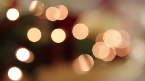 休日のキラキラ ボケの背景を持つライトを点滅 — ストック動画