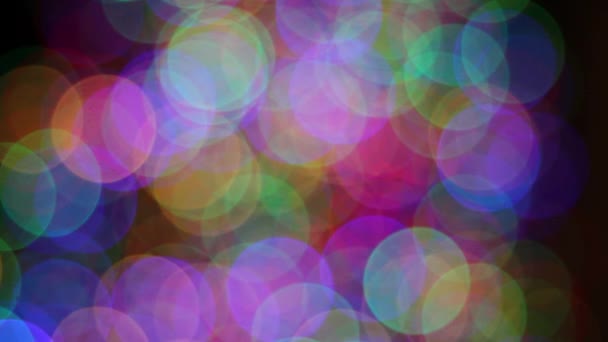 Luces coloridas de vacaciones con fondo brillante de Bokeh — Vídeos de Stock