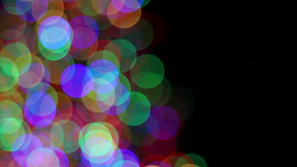 Vacanza Illuminazione colorata Sfocatura Defocus Bokeh sul nero — Video Stock