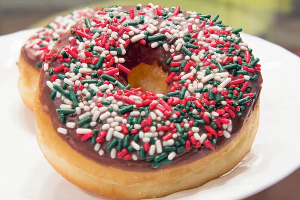 Donuts with Christmas Sprinkles Front Closeup — Stock Photo, Image