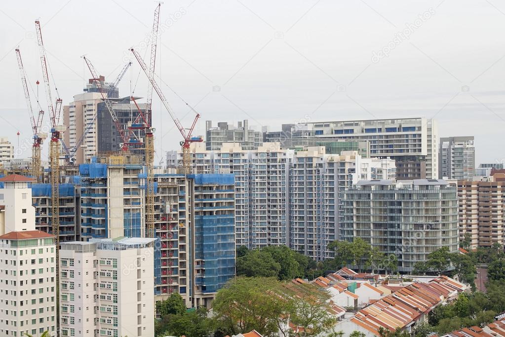 Condominiums Construction with Cranes