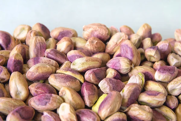 Nueces de pistacho apiladas —  Fotos de Stock