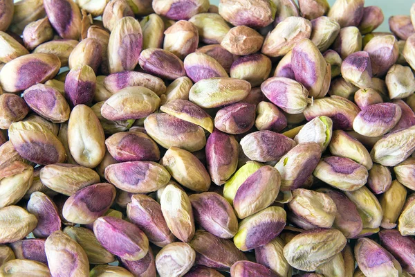 Tuercas de pistacho bombardeadas Fondo — Foto de Stock