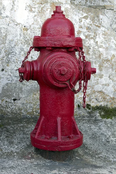 Roter Feuerhydrant mit Grunge-Hintergrund — Stockfoto