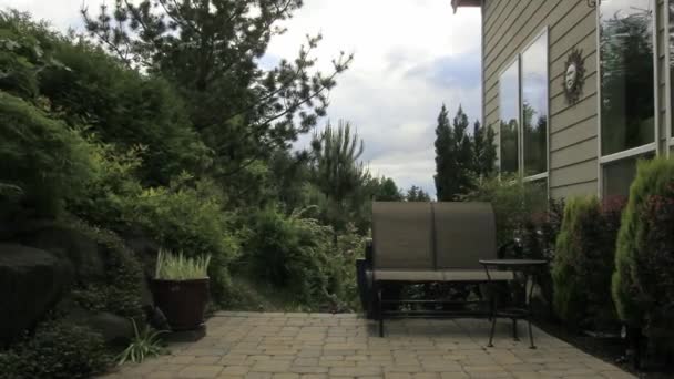 Timelapse of Backyard Patio Garden with Moving White Clouds Blue Sky and Window Reflection 1920x1080 — Stock Video