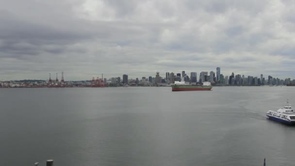 Vancouver BC British Columbia Canada Skyline Cityscape with Moving Clouds and Sea Transportation from Lonsdale Market Time Lapse 1080p — Stock Video