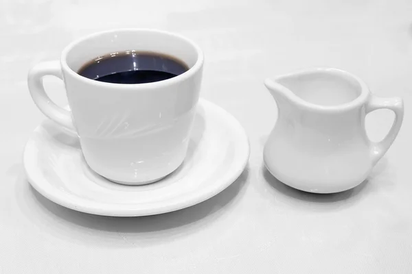 Koffie kopje schotel en creamer — Stockfoto