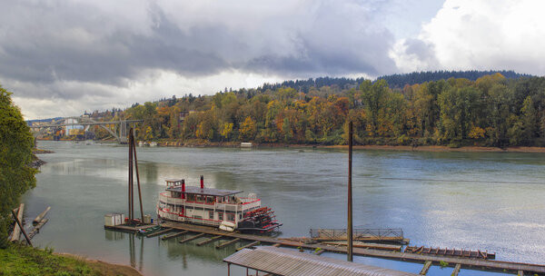 Historic Sternwheeler Docked Along Willamette River in Fall