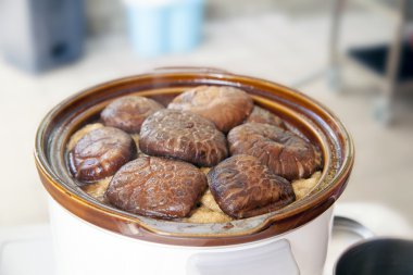 Stewed Shiitake Mushrooms in Slow Cooker Pot clipart