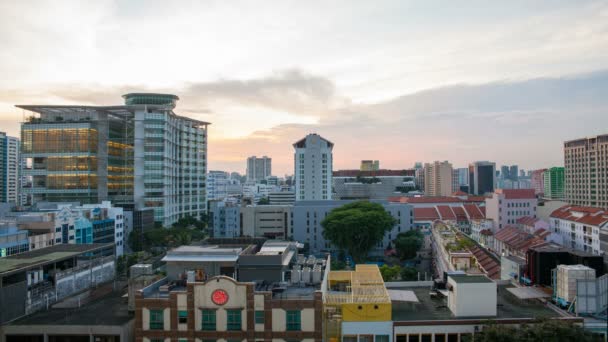 BUGIS, SINGAPORE - MAY 25, 2014: Time lapse movie of sunset over Bugis area in Singapore. Bugis is a popular area with tourists and locals alike. It is a hotspot for entertainment, food, and shopping — Stock Video