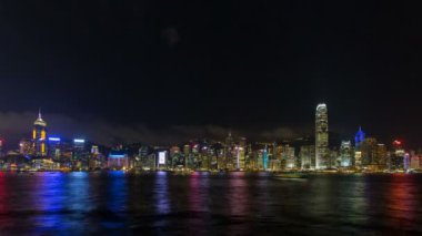 zaman atlamalı Senfoni ışıkların Merkezi hong kong kowloon, hong kong, tsim sha tsui bakıldığında Show'da. Bu gece ışıkları ve ses göstermek ve turistler ve yerliler arasında büyük bir beraberlik olduğunu. 1080p