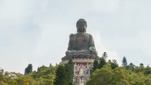 NGONG PING, HONG KONG - MAY 29, 2014: Time lapse of locals and tourists climbing the steps to Tian Tan Big Buddha at Ngong Ping near Po Lin Monastery. This is a major center of Buddhism in Hong Kong — Stock Video