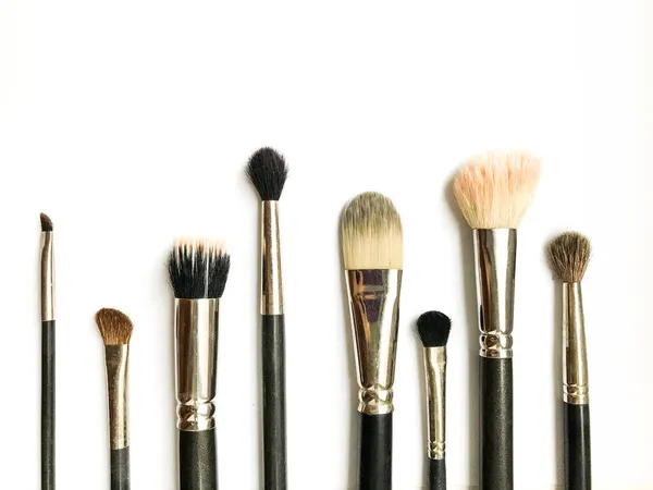 Conjunto Diferentes Pinceles Maquillaje Imagen Laico Plano — Foto de Stock