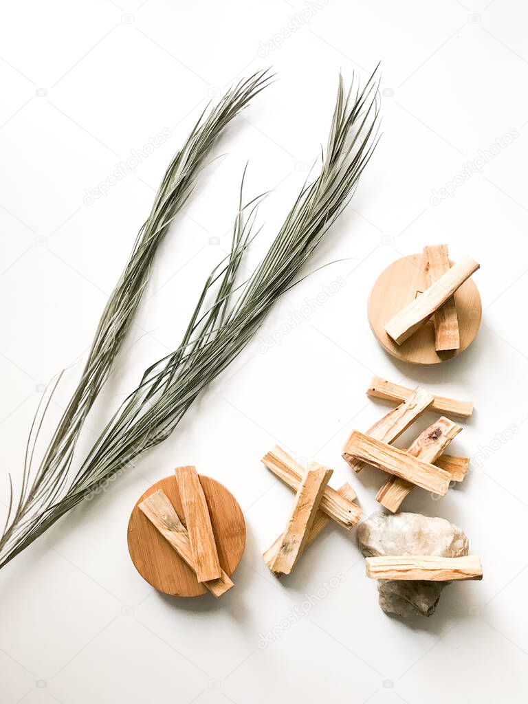 palo santo from peru, magic incense, beautiful layout of wooden blocks on a white background