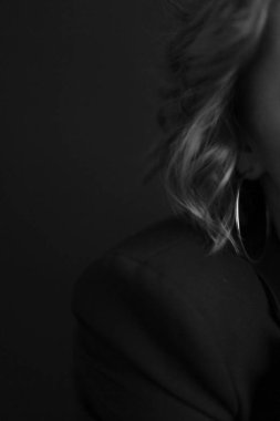 female body details close-up, black and white frame , defocusing