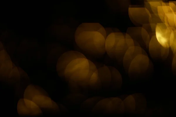 Abstraktní Pozadí Oranžového Bokeh Novoroční Koncept Malá Světla Rozmazaném Ohnisku — Stock fotografie