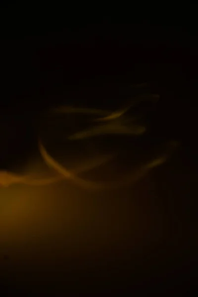 抽象的なオレンジ黄色の背景 グレアとブラー 表面の波紋 輝きと火花 — ストック写真