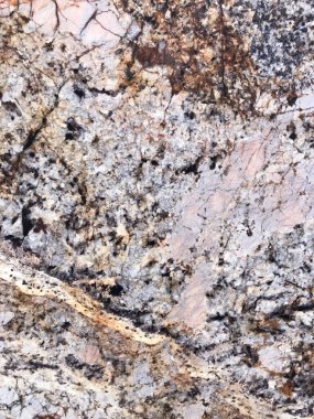 Doğal mineralden yapılmış taş bir duvarın dokusu, yakın plan, makro fotoğrafçılık.