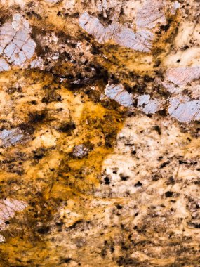 Doğal mineralden yapılmış taş bir duvarın dokusu, yakın plan, makro fotoğrafçılık.