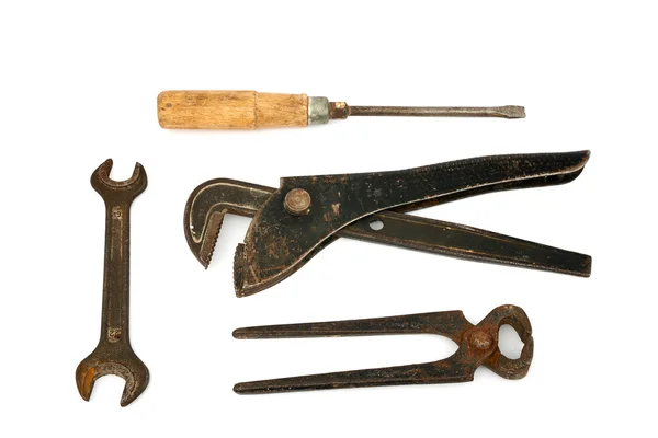 Регулируемый гаечный ключ со старыми инструментами — стоковое фото