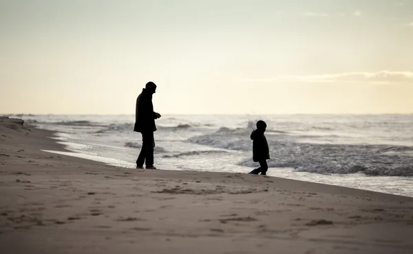 Autumn walk on a beach — Stock Photo, Image