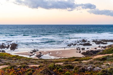Nossa Senhora Beach in Almograve Lonqueira at sunset, Alentejo, west of Portugal