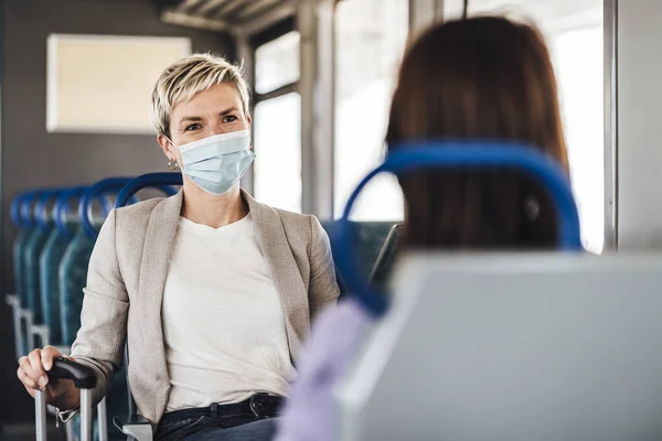 Couple Friends Wearing Mask Nicely Talking While Traveling Train — Stock Photo, Image