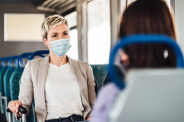 Couple Friends Wearing Mask Nicely Talking While Traveling Train — Stock Photo, Image
